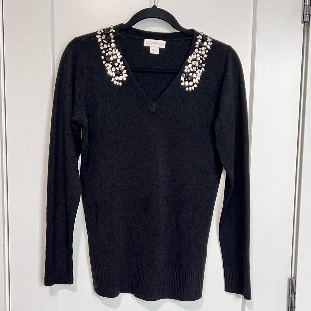 Black v-neck sweater with rhinestone neck detail
